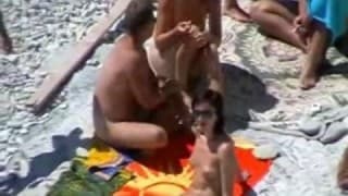 Two unsuspecting couples are filmed secretly on nudist beach Two unsuspecting couples are filmed secretly on nudist beach