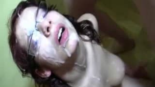 Young slut takes a bukkake with her glasses on Young slut takes a bukkake with her glasses on