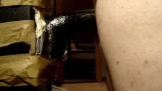 A gay guy sits on a thick black dildo A gay guy sits on a thick black dildo