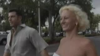 A mature blonde woman enjoying sex with her man A mature blonde woman enjoying sex with her man