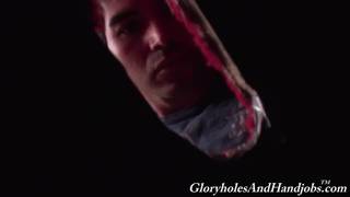 Damien gives a stranger a blowjob through a gloryhole Damien gives a stranger a blowjob through a gloryhole
