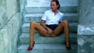 A French mommy is masturbating outside A French mommy is masturbating outside