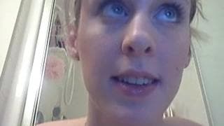 This naughty blonde caresses in the shower This naughty blonde caresses in the shower
