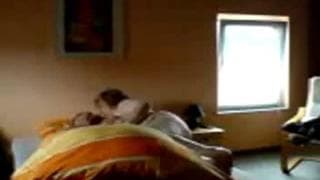 A pregnant girl and her husband in bed!