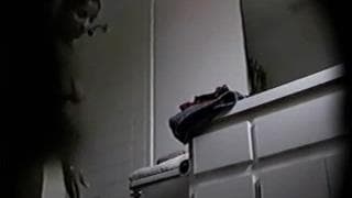 A milf who is spied on while changing clothes A milf who is spied on while changing clothes