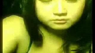 A sexy asian bitch shows her tits on cam