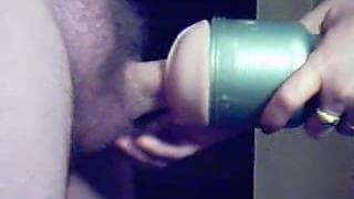 She wanks him off with a sex toy!