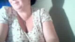 This mature lady is showing us her boobs