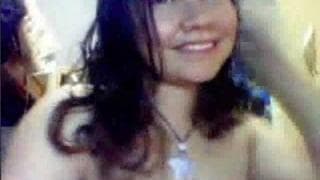 This young girl fingers herself on cam