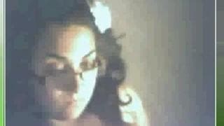 A busty brunette is displayed on webcam!