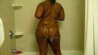 This black bitch has fun in the shower This black bitch has fun in the shower