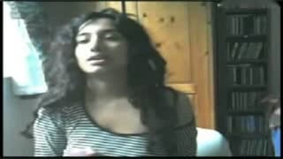 Facing the camera and playing with her tits Facing the camera and playing with her tits
