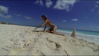 Showing her hot body on the beach Showing her hot body on the beach