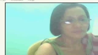 Here we see a mature woman touching herself