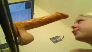 She uses a dildo to practice her sucking She uses a dildo to practice her sucking