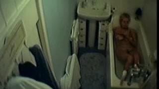 This lady gets naked in the bathtub This lady gets naked in the bathtub