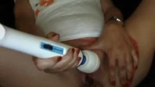 She eagerly masturbates with her vibrator