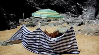 She masturbates naked on the beach here She masturbates naked on the beach here