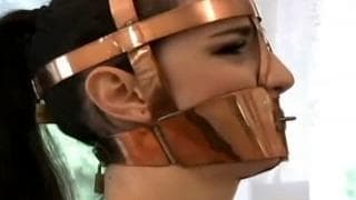 She puts a muzzle on her and then masturbates She puts a muzzle on her and then masturbates