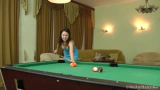 Roxy fingers her hairy pussy on a pool table Roxy fingers her hairy pussy on a pool table