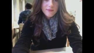 Emma masturbates in a public library