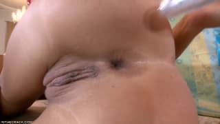 A sexy woman filling her pussy with toys A sexy woman filling her pussy with toys