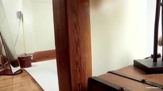 Brad grabs his dick and stretches it out