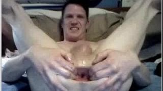 Here we see a guy shoving things in his ass Here we see a guy shoving things in his ass