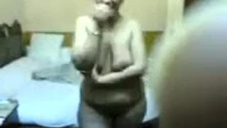 Fat woman with big tits caresses on webcam