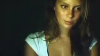 Pretty brunette enjoys caressing herself