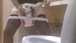 Transvestite guy wanking off in the toilet Transvestite guy wanking off in the toilet