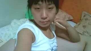 Asian young babe is recording this porno