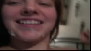 This brunette is having her face covered This brunette is having her face covered