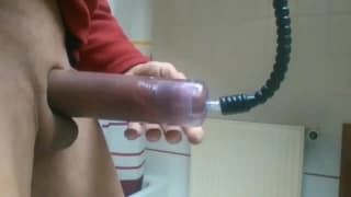 Sexy guy using a pump on his big cock. Sexy guy using a pump on his big cock.