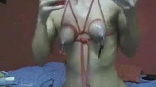 This kinky bitch loves to tie her tits This kinky bitch loves to tie her tits