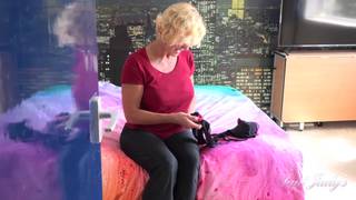 Beautiful mommy is alone on her bed masturbating Beautiful mommy is alone on her bed masturbating