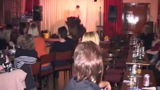 A guy in a thong offers his dick to several women A guy in a thong offers his dick to several women