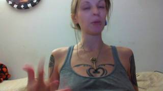 Pregnant tattooed girl showing off her milky breasts Pregnant tattooed girl showing off her milky breasts