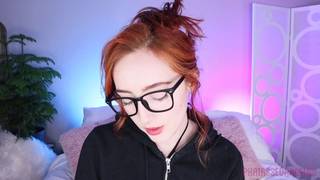 Pretty redhead sucks on her new toy Pretty redhead sucks on her new toy