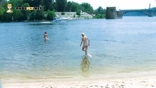 Nudist teens with slim body is enjoying the sun on the rocky beach Young, Full HD, Beach Porn