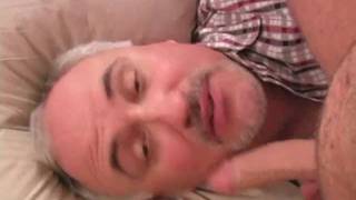 Lukas shoots a juicy load of cum on Jake's old face