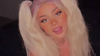 Cute blonde sucks a dildo for views