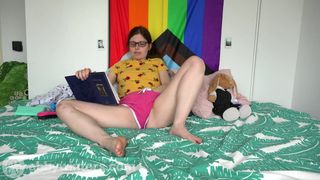 Brunette LGBT opens her favorite book, her swollen pussy