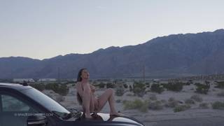 Emma G rides a dildo on top of a car in the middle of the desert Emma G rides a dildo on top of a car in the middle of the desert