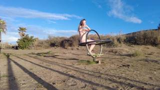 Blondie shows off and masturbates outdoors with her multicolored dildo