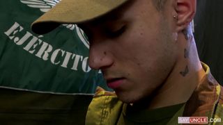 Military teen kneels down to suck his superior's cocks