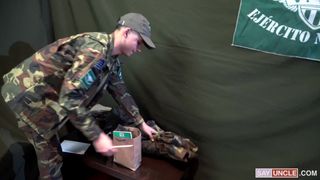 Military teen kneels down to suck his superior's cocks