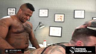 Three muscular man fucking and fisting hardcore at the tattoo shop