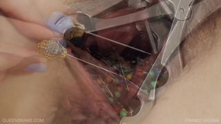 She masturbates by sticking a ton of needles in her pussy
