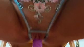 Watch how this long dildo slides in and out of this brunette slut